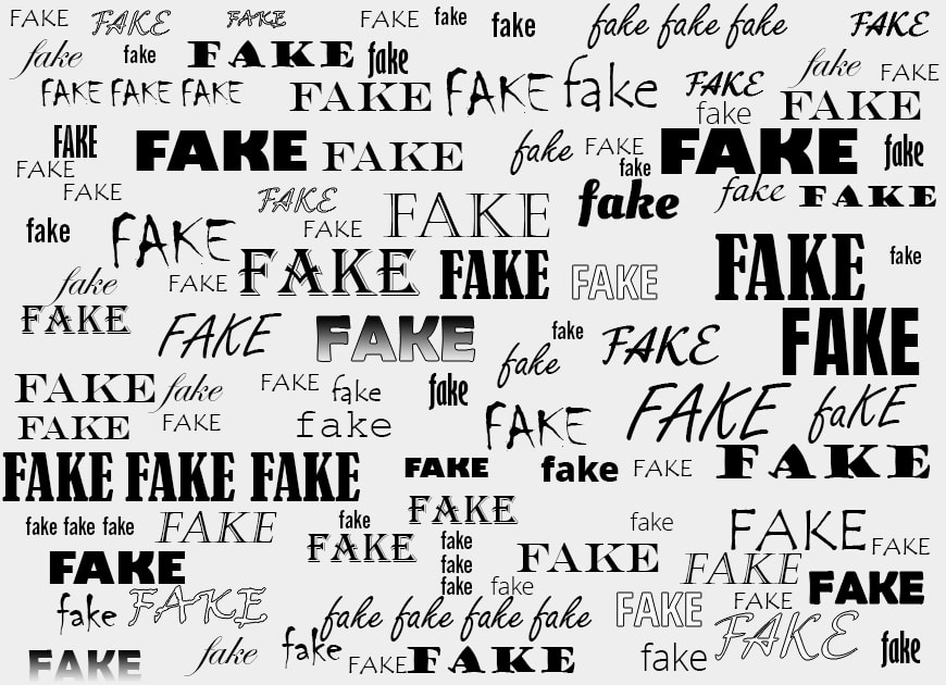Viele verschiedene Schriftarten und -größen, die das Wort „FAKE“ wiederholen.